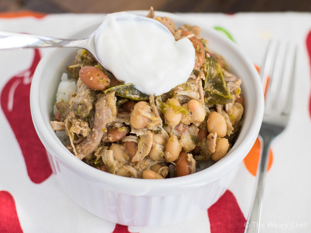 Slow Cooker Pork and Beans with Poblano Peppers is a super simple dinner recipe that tastes incredible! #pork #crockpot #slowcooker #beans