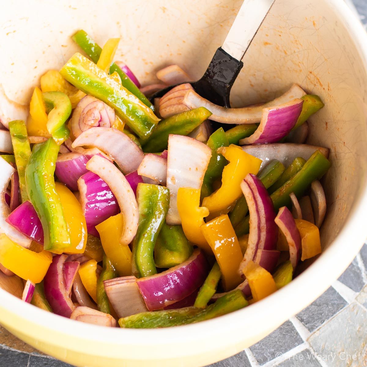 Grilled Sriracha Peppers and Onions with Sausages are an easy meal for summer entertaining!