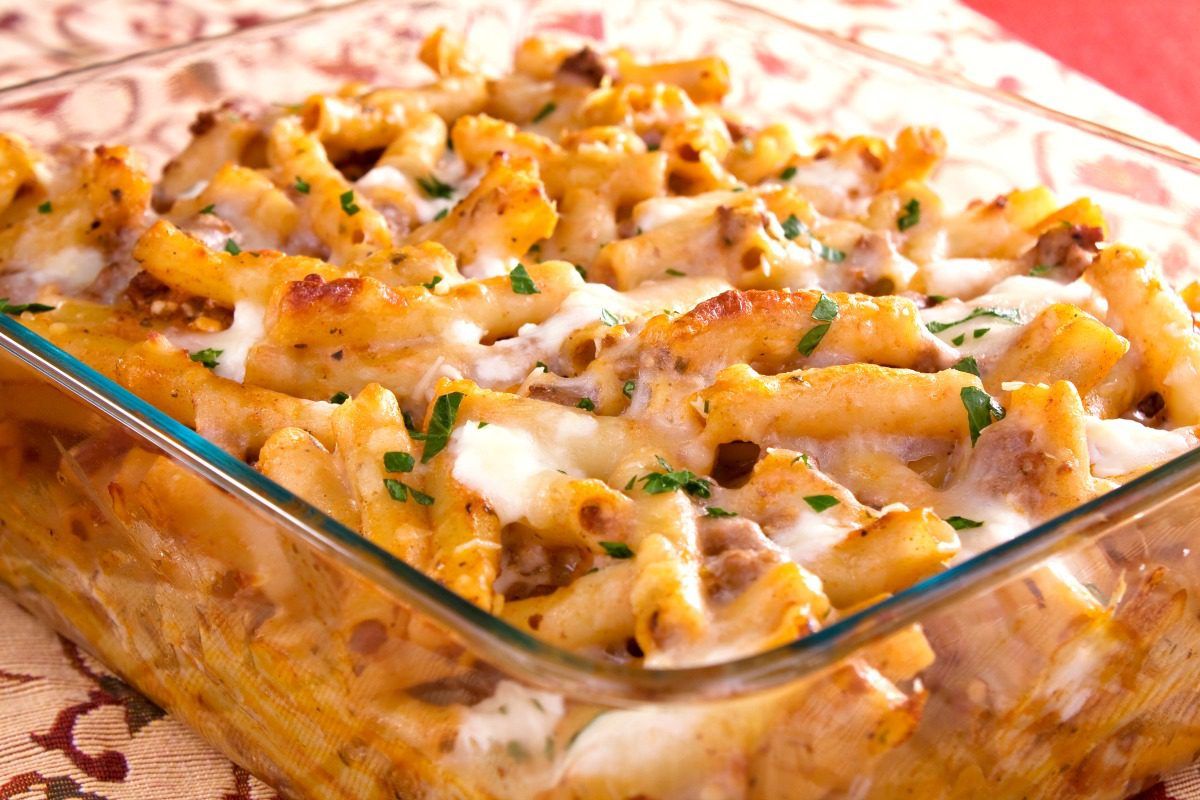 Classic Baked Ziti Noodles are made easy in this recipe with Italian sausage and jarred pasta sauce. Enjoy this comfort food pasta dish on a weeknight, for Sunday dinner, or take it to a potluck! #thewearychef #bakedziti #bakedpasta #casserole #sausage #easydinner