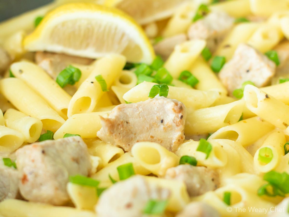 This one-pot Lemon Garlic Pasta with Pork can be on the table in about a half hour. It's a dish the whole family will love and perfect for busy nights! #thewearychef #pasta #pork #dinner #easyrecipe #sponsored