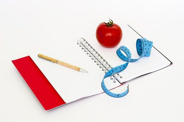 tape measure, pen and notebook which can help you monitoring your weight