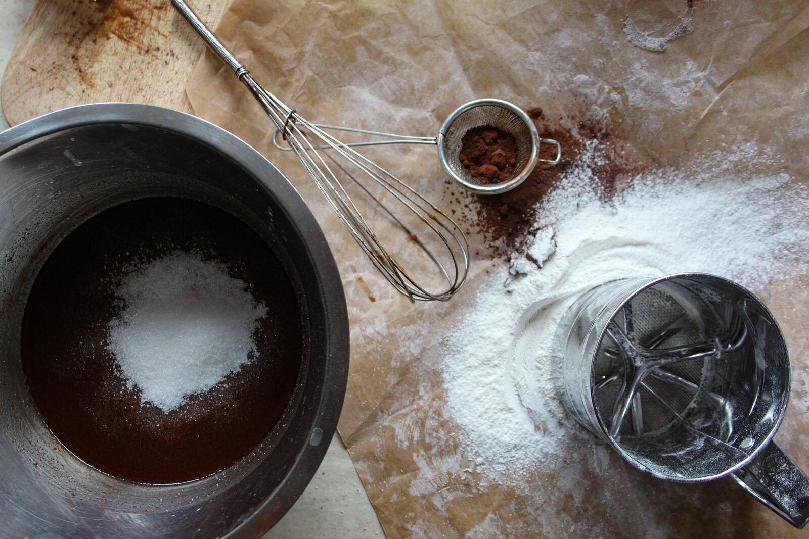 A variety of kitchen tools that can all be replaced with Kitchenaid Food Processor Attachments.