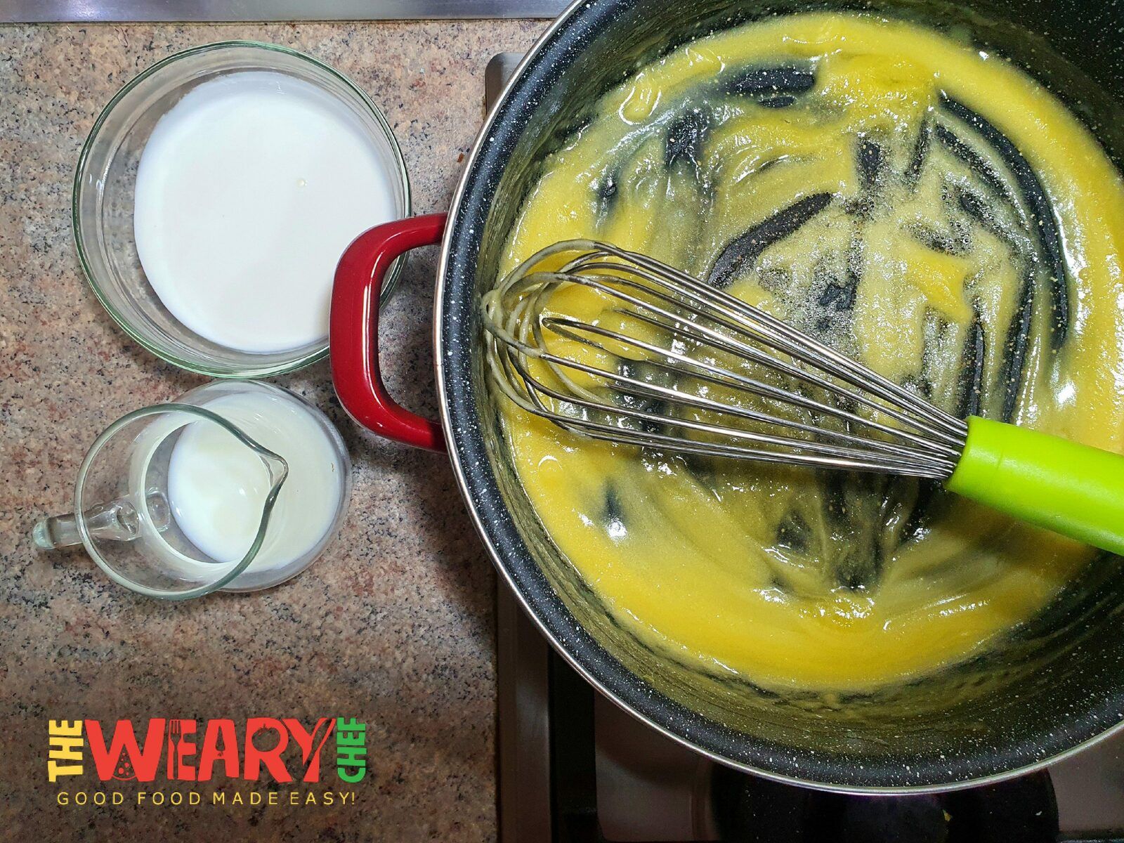 milk and cream near saucepan