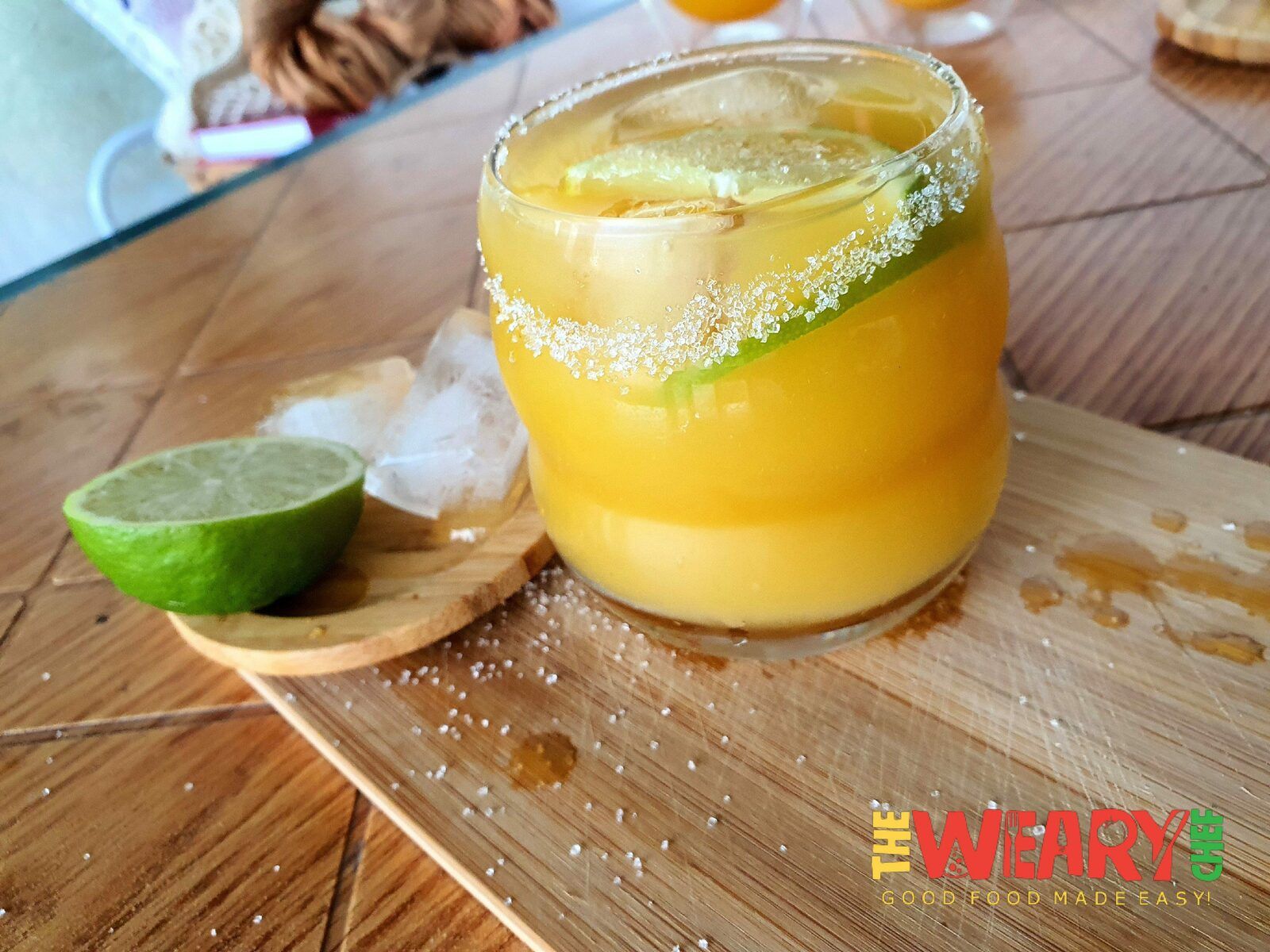 cocktail glass with mango cocktail