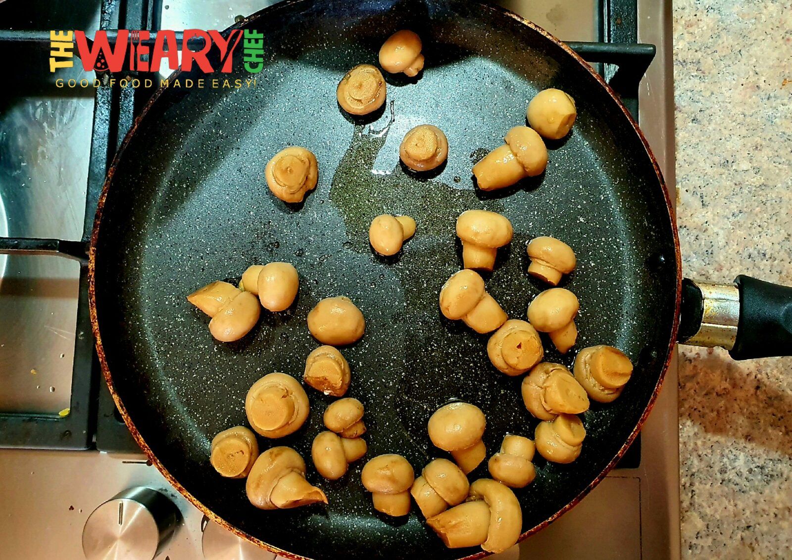 canned mushrooms in pan
