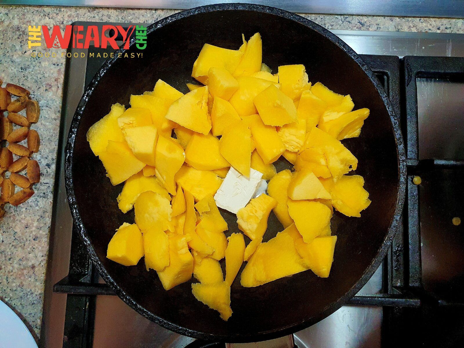 butternut pieces in pan with butter