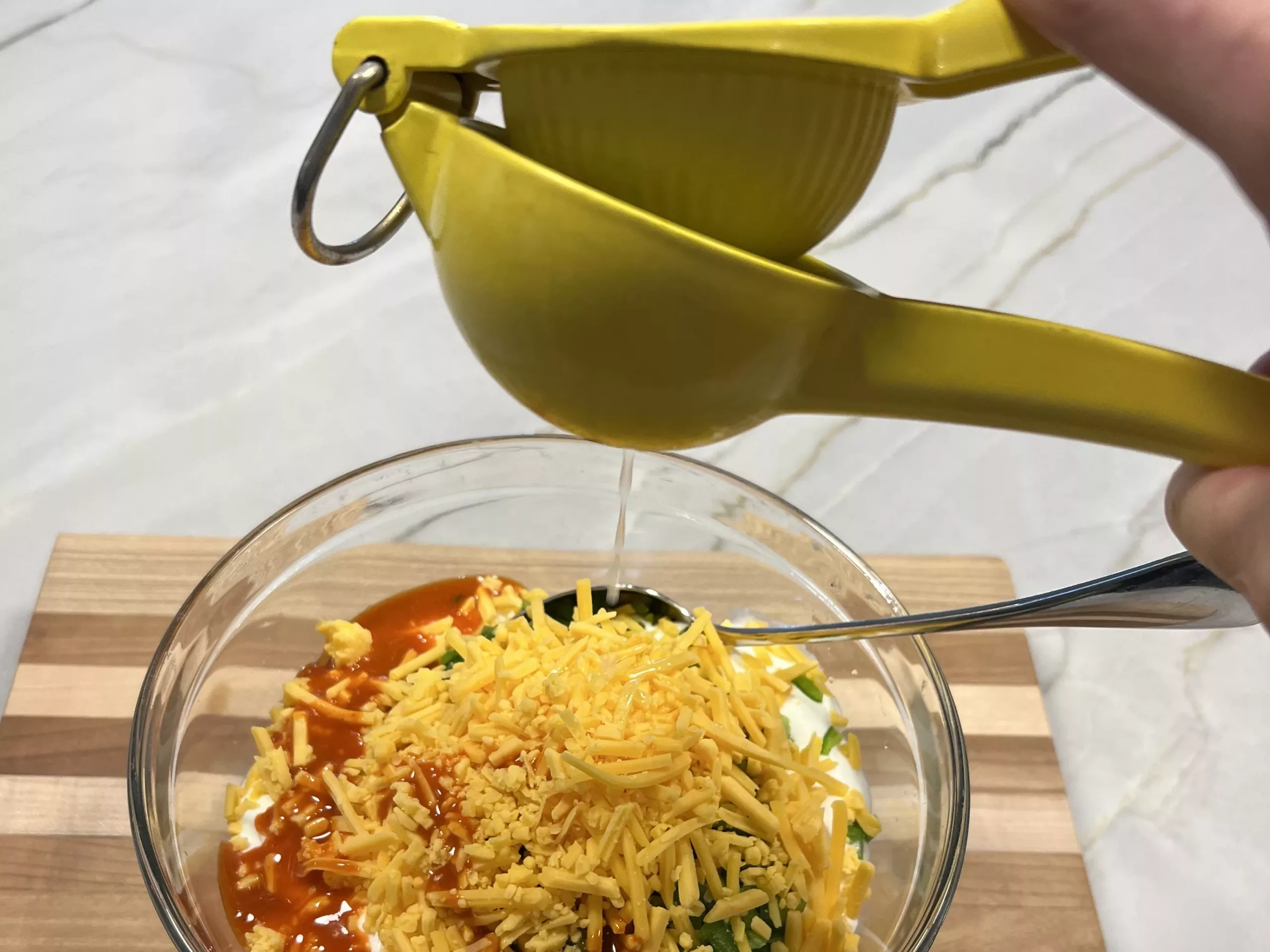 cheesy sour cream dip is easy to make and can be hand mixed in a bowl