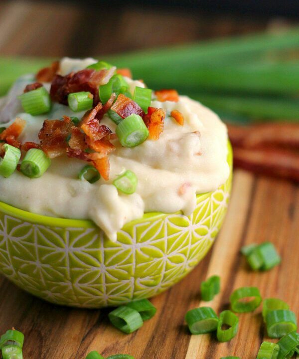 Loaded Mashed Potatoes with Cheese and Bacon - This comforting side dish is skinnier than it looks!